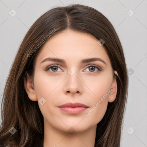 Neutral white young-adult female with long  brown hair and brown eyes