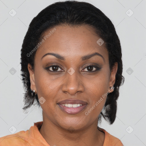Joyful black young-adult female with medium  brown hair and brown eyes