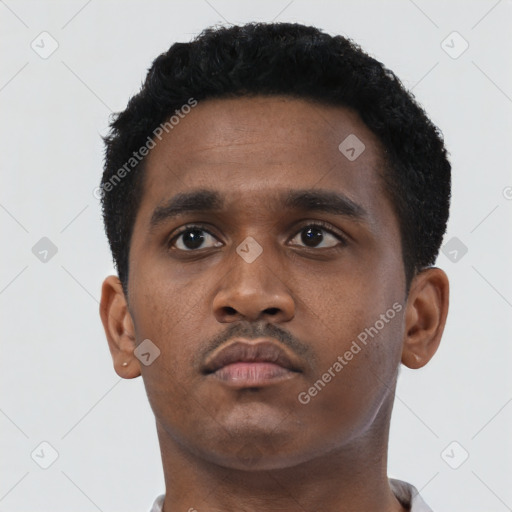 Neutral black young-adult male with short  black hair and brown eyes