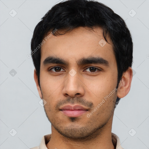 Neutral latino young-adult male with short  black hair and brown eyes