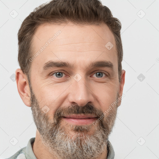 Joyful white adult male with short  brown hair and grey eyes