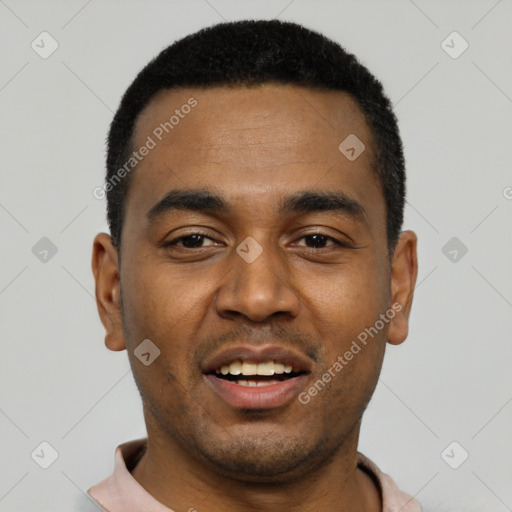 Joyful black young-adult male with short  black hair and brown eyes