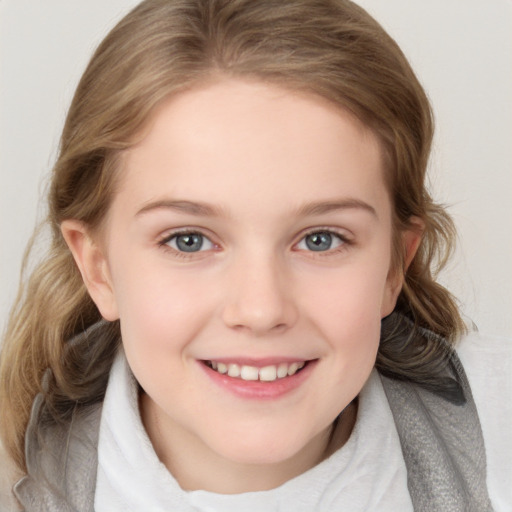 Joyful white child female with medium  brown hair and blue eyes