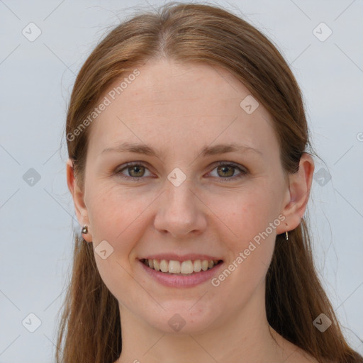 Joyful white young-adult female with long  brown hair and grey eyes