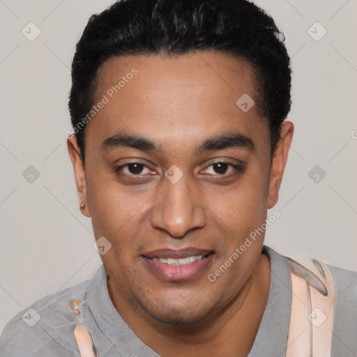 Joyful latino young-adult male with short  black hair and brown eyes