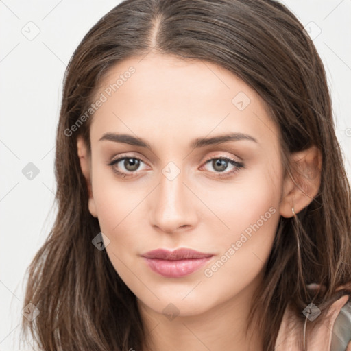 Neutral white young-adult female with long  brown hair and brown eyes