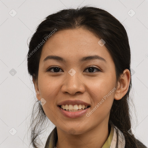 Joyful asian young-adult female with long  brown hair and brown eyes