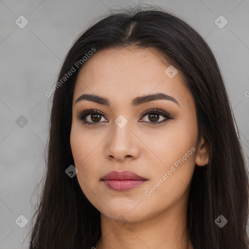 Neutral latino young-adult female with long  brown hair and brown eyes