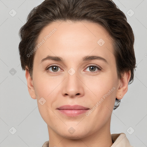 Joyful white young-adult female with short  brown hair and brown eyes