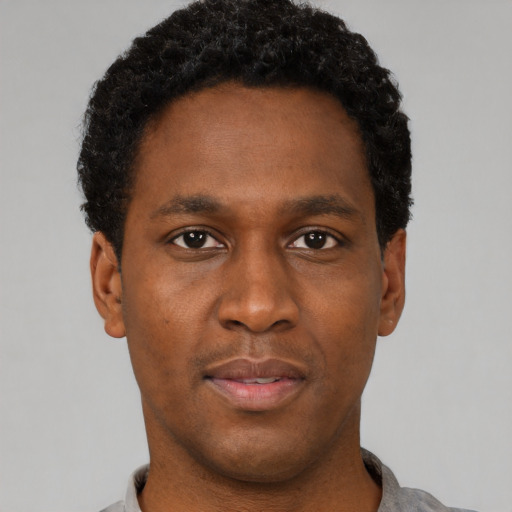 Neutral black young-adult male with short  brown hair and brown eyes