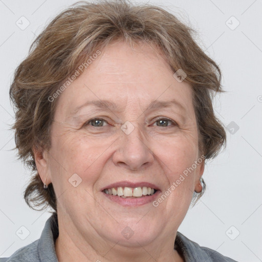 Joyful white middle-aged female with medium  brown hair and brown eyes