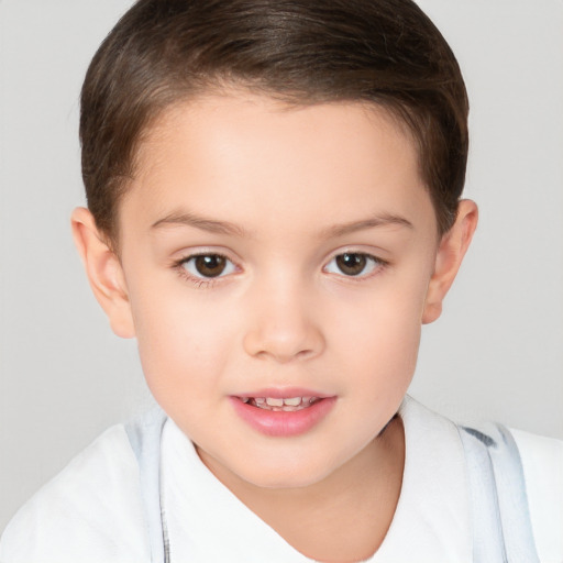 Joyful white child female with short  brown hair and brown eyes