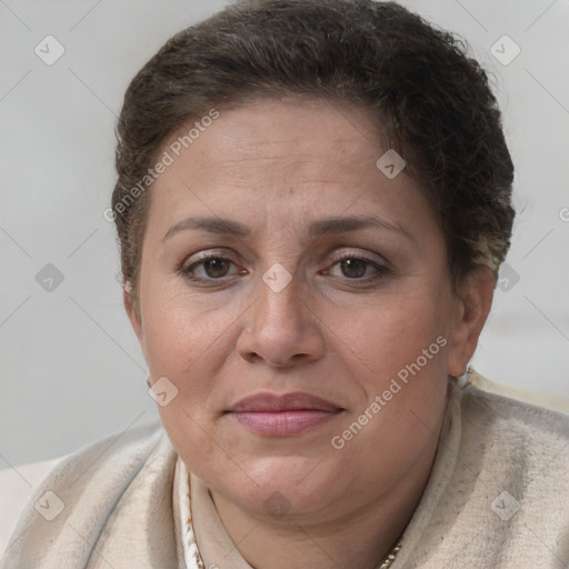 Joyful white adult female with short  brown hair and brown eyes