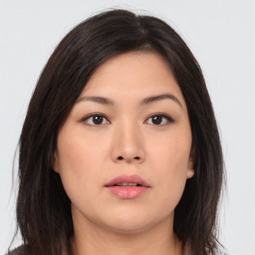Neutral asian young-adult female with long  brown hair and brown eyes