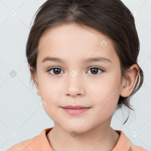 Joyful white child female with medium  brown hair and brown eyes