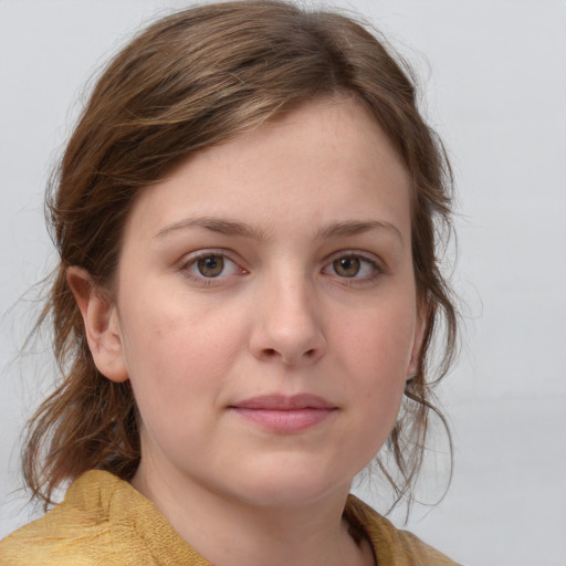 Neutral white young-adult female with medium  brown hair and grey eyes