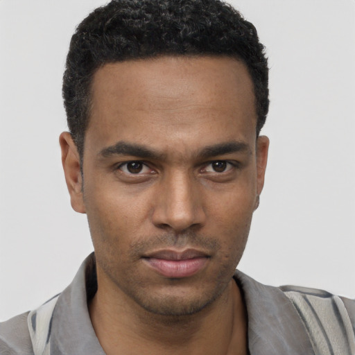 Neutral black young-adult male with short  black hair and brown eyes