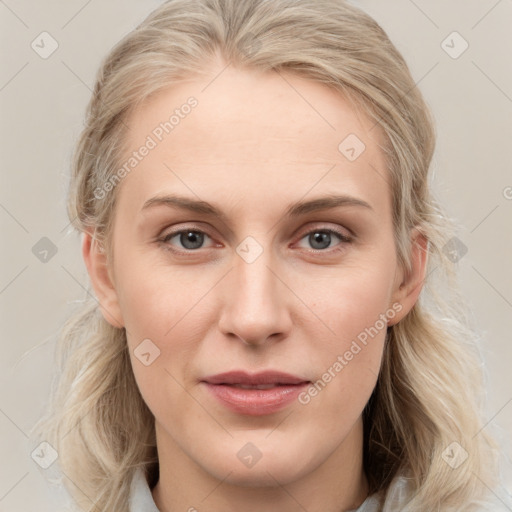 Joyful white young-adult female with medium  brown hair and blue eyes