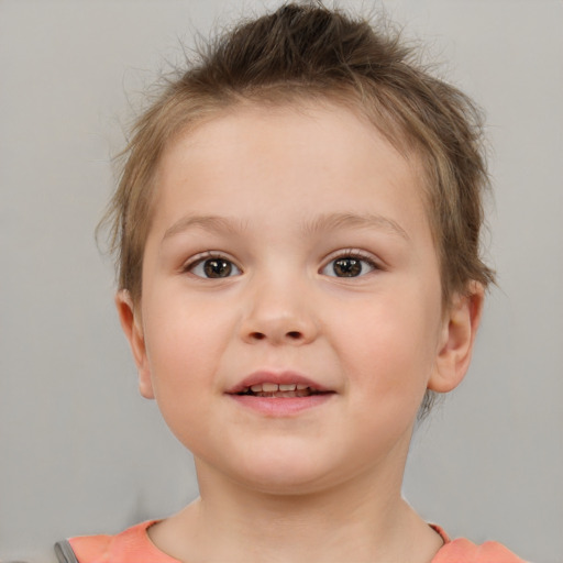 Joyful white child female with short  brown hair and brown eyes