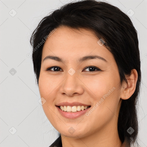 Joyful white young-adult female with medium  brown hair and brown eyes