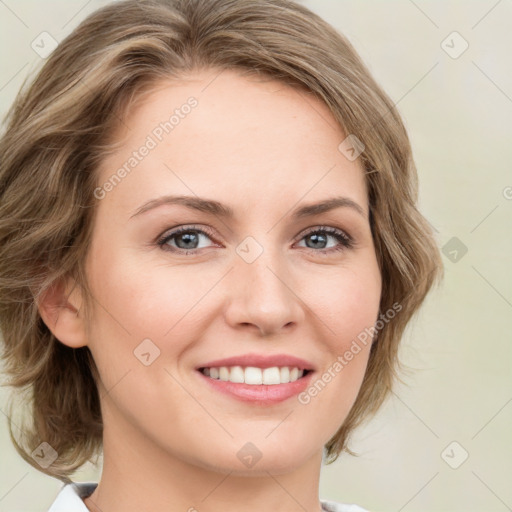 Joyful white young-adult female with medium  brown hair and green eyes