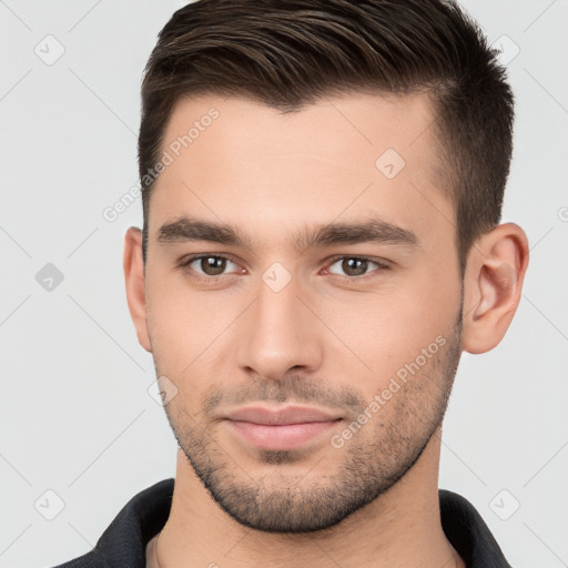 Neutral white young-adult male with short  brown hair and brown eyes