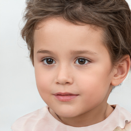 Joyful white child female with short  brown hair and brown eyes