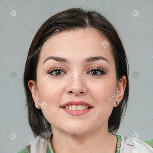 Joyful white young-adult female with medium  brown hair and brown eyes