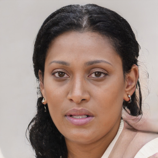 Neutral latino young-adult female with medium  black hair and brown eyes