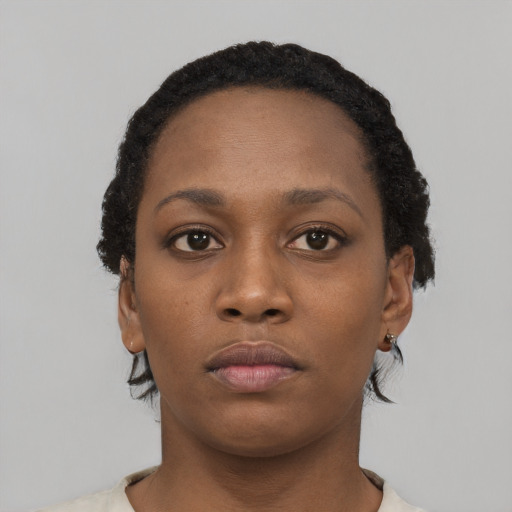 Neutral black young-adult female with short  black hair and brown eyes