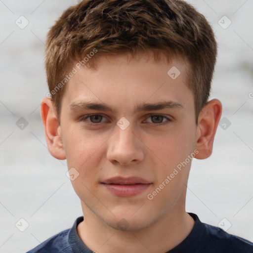 Joyful white child male with short  brown hair and brown eyes