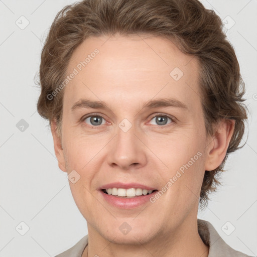 Joyful white adult female with short  brown hair and grey eyes