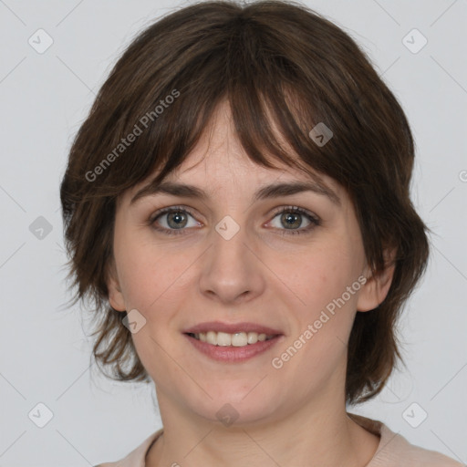 Joyful white young-adult female with medium  brown hair and grey eyes