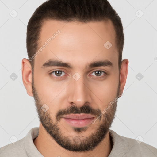 Joyful white young-adult male with short  brown hair and brown eyes