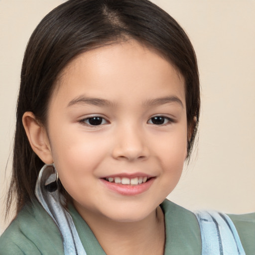 Joyful white child female with medium  brown hair and brown eyes