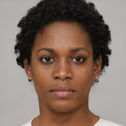 Neutral black young-adult female with short  black hair and brown eyes