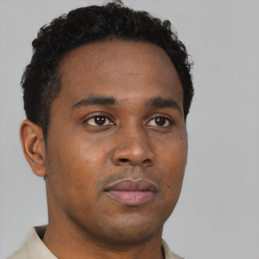 Neutral black young-adult male with short  brown hair and brown eyes