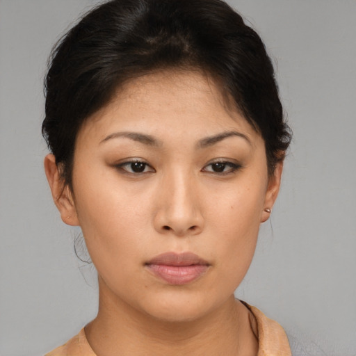 Neutral asian young-adult female with short  brown hair and brown eyes