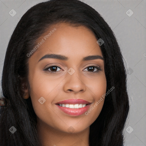 Joyful latino young-adult female with long  black hair and brown eyes