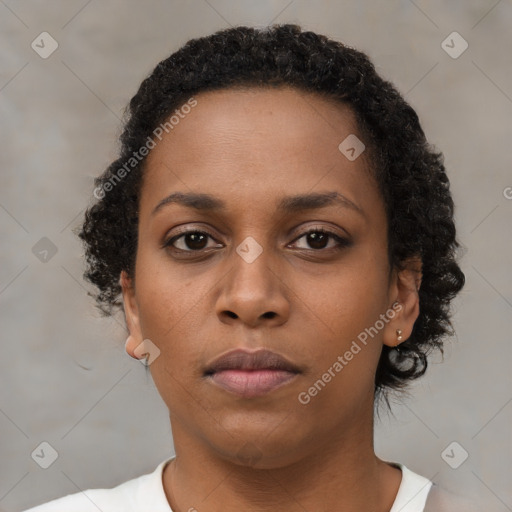 Neutral black young-adult female with short  brown hair and brown eyes