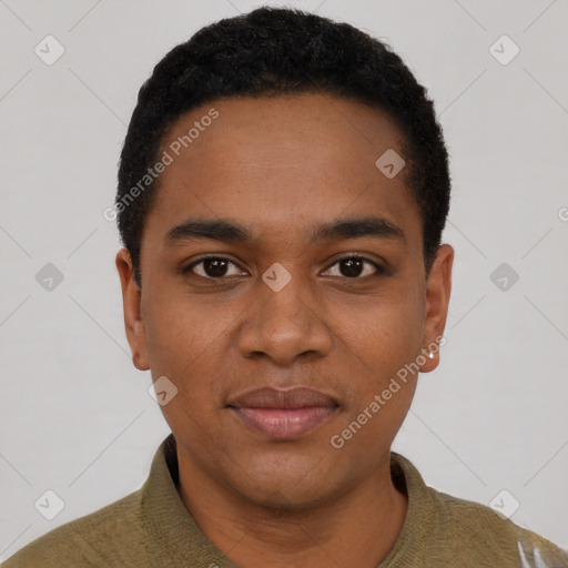 Joyful black young-adult male with short  black hair and brown eyes