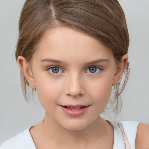 Joyful white child female with medium  brown hair and grey eyes