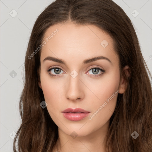 Neutral white young-adult female with long  brown hair and brown eyes