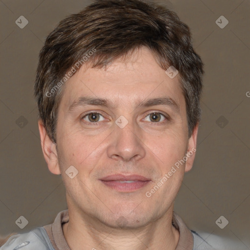 Joyful white adult male with short  brown hair and brown eyes