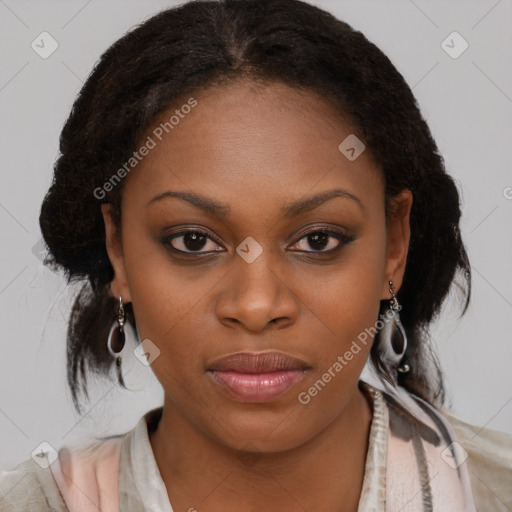 Joyful black young-adult female with medium  brown hair and brown eyes