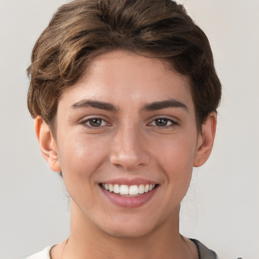 Joyful white young-adult female with short  brown hair and brown eyes