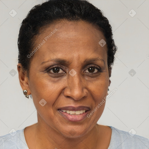 Joyful black adult female with short  brown hair and brown eyes