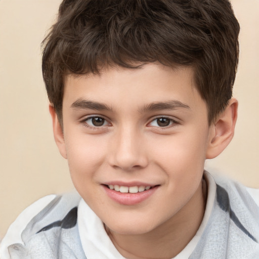 Joyful white child male with short  brown hair and brown eyes