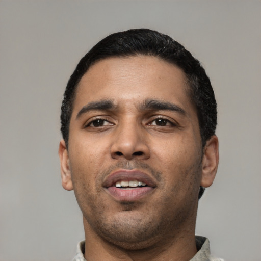 Neutral latino young-adult male with short  black hair and brown eyes