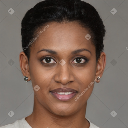 Joyful black young-adult female with short  brown hair and brown eyes